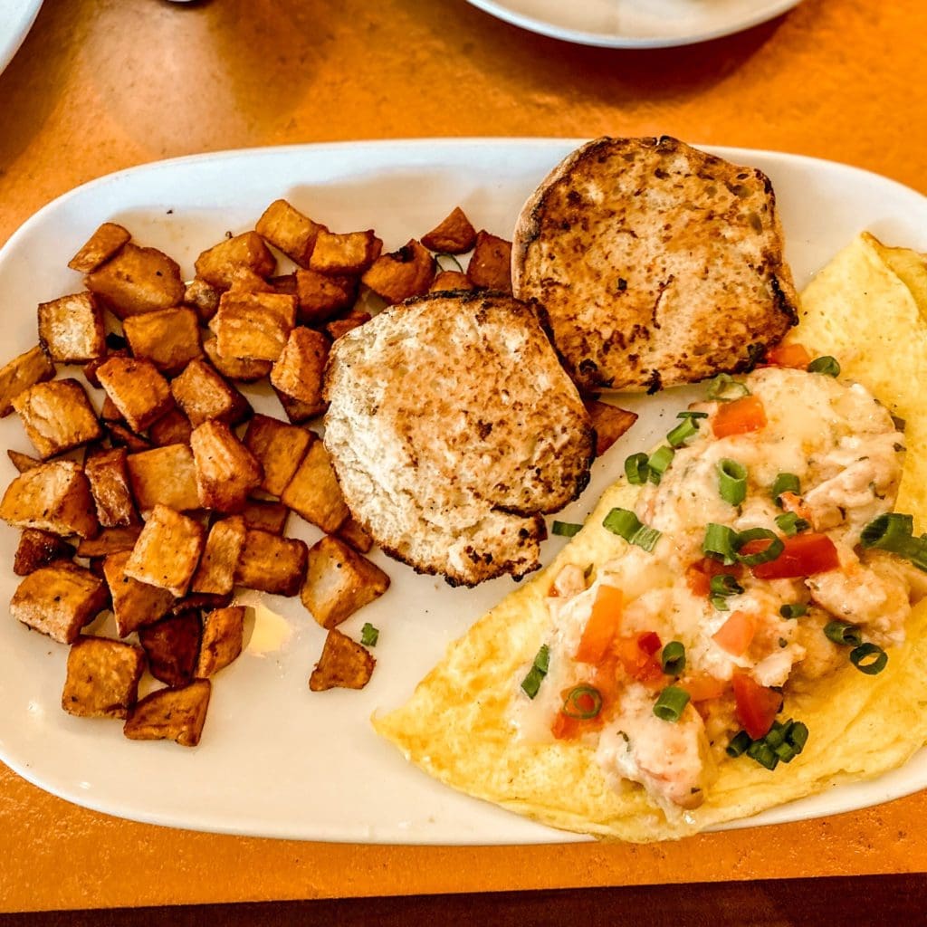 Omelette, potatoes, and biscuits brunch options at Another Broken Egg in Memphis, TN.