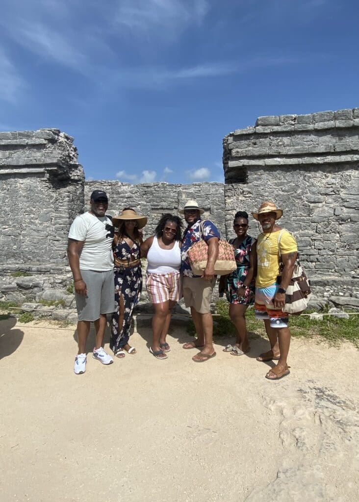 6 people at the Maya ruins in Tulum, Mexico